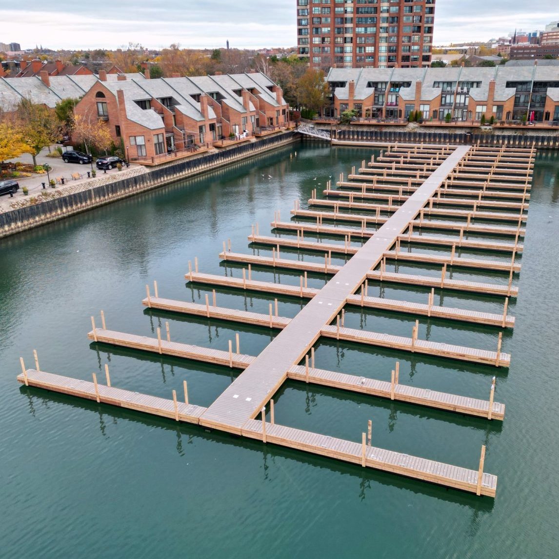 Commercial steel tube floating dock system with gray composite decking